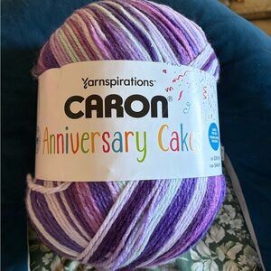 Caron Anniversary Cakes color is Hocus Crocus Ltd Edition- Purple Lavender White
